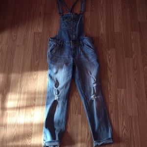 Cuffed and distressed overalls worn once